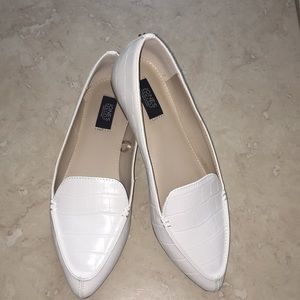 White pointed flats